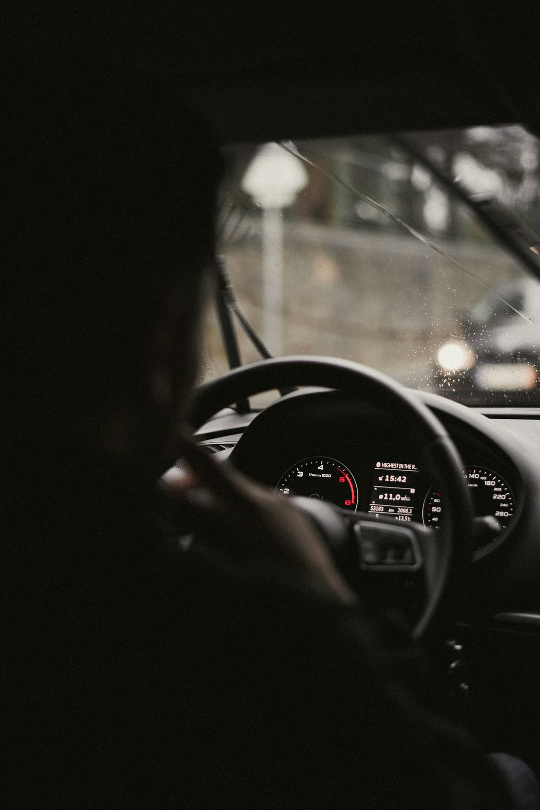 man driving vehicle during daytime