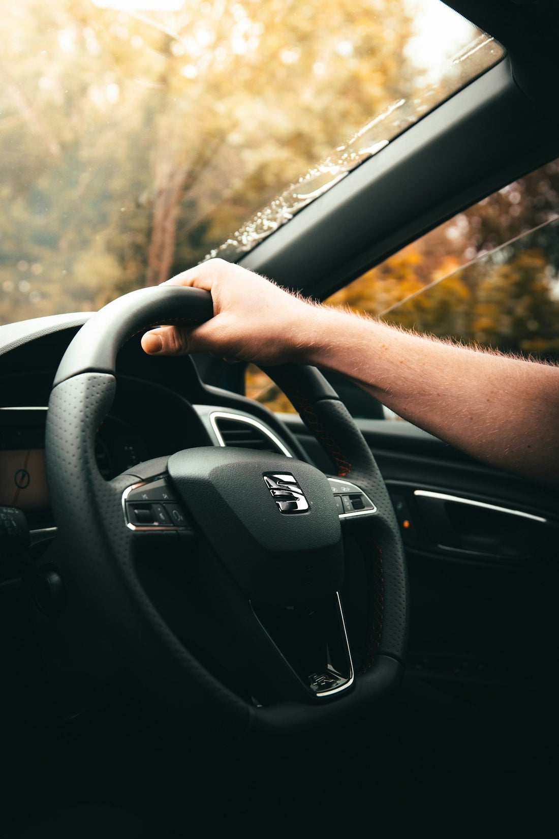 Learner driver practising in a car while preparing for a driving test