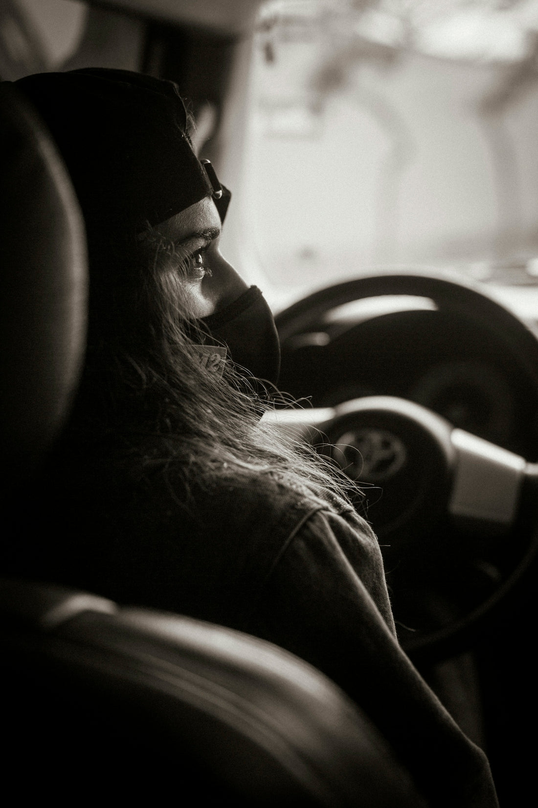 grayscale photo of woman wearing sunglasses