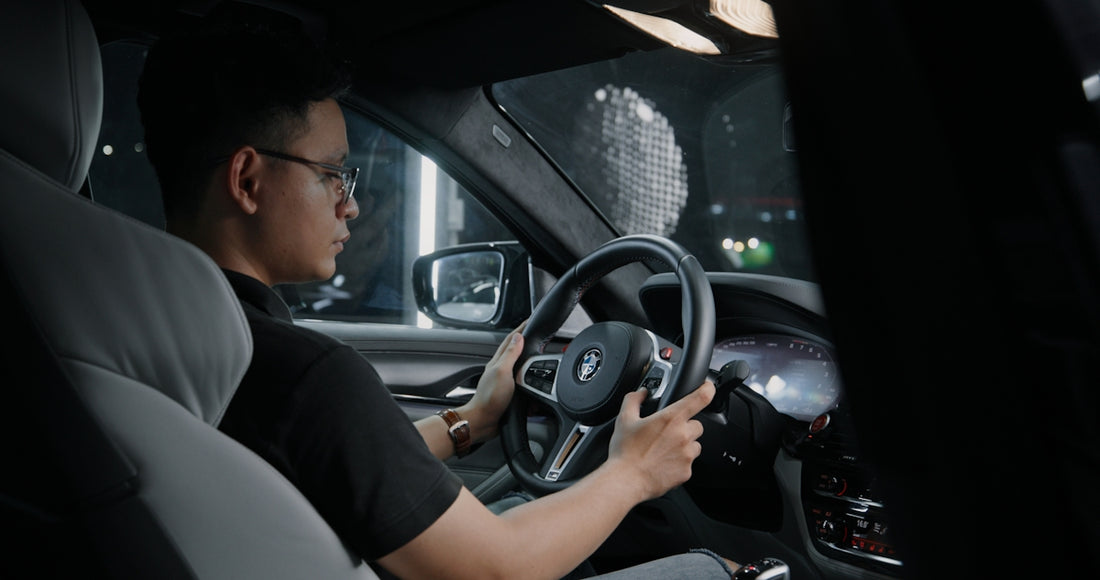 a man driving a car